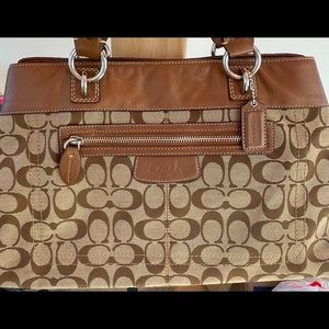 Vintage Coach signature hand bag. She was well-loved and in great shape for age!